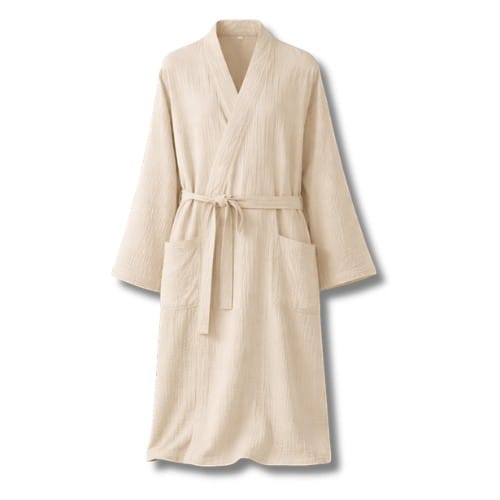 Le Monde du Peignoir beige cotton minimalist kimono robe with tie waist and pockets.