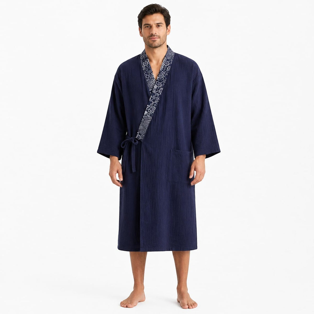Le Monde du Peignoir navy blue cotton kimono robe with white patterned trim and tie waist. Men's lightweight loungewear with pockets.
