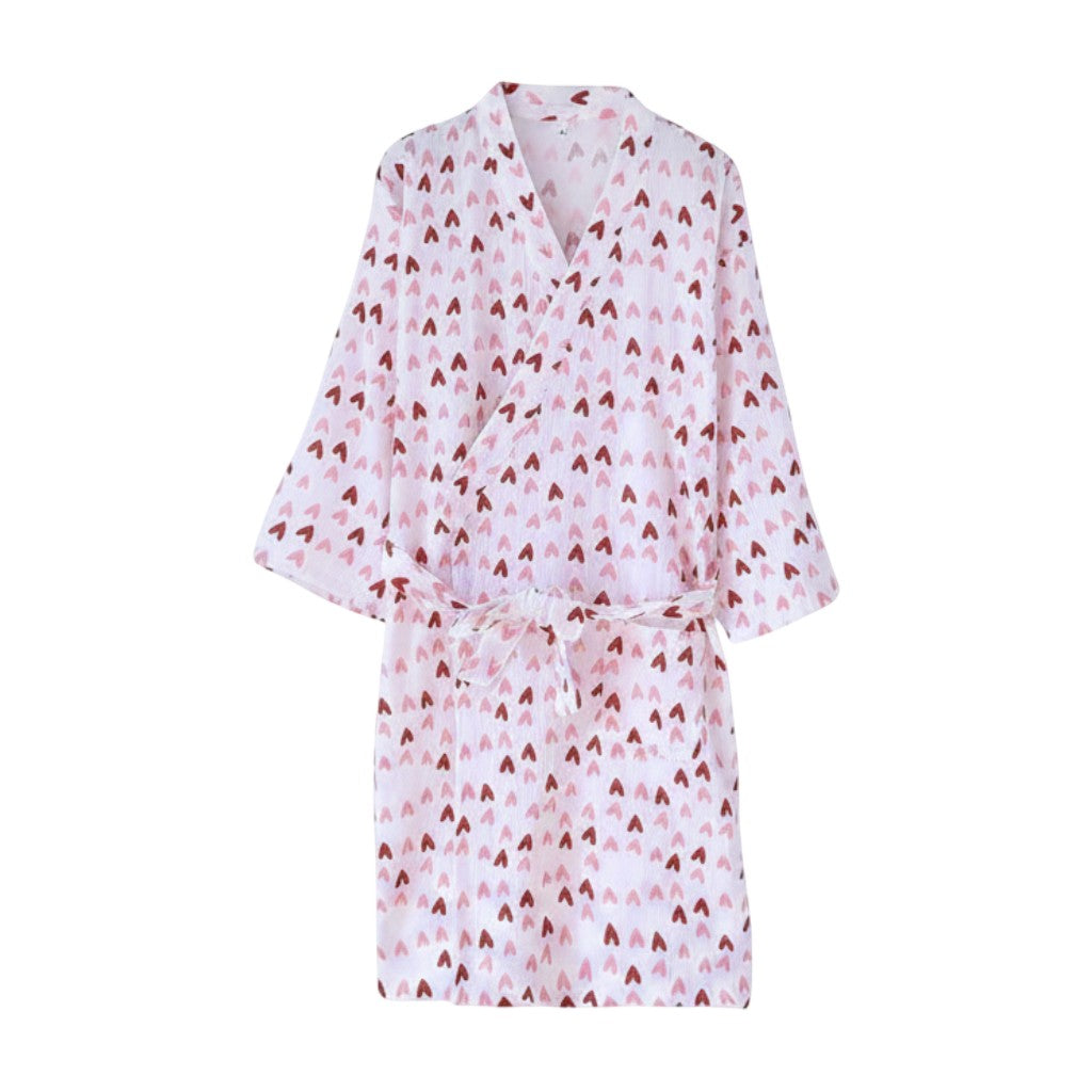 Le Monde du Peignoir white cotton kimono robe with pink and red heart pattern, tie waist, and 3/4 sleeves.